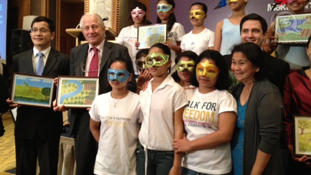 TRAFFICKING FIGHTER. Visayan Forum executive director Cecille Oebanda (first from right), who is with trafficking survivors in this photo, is among those accused of fraud