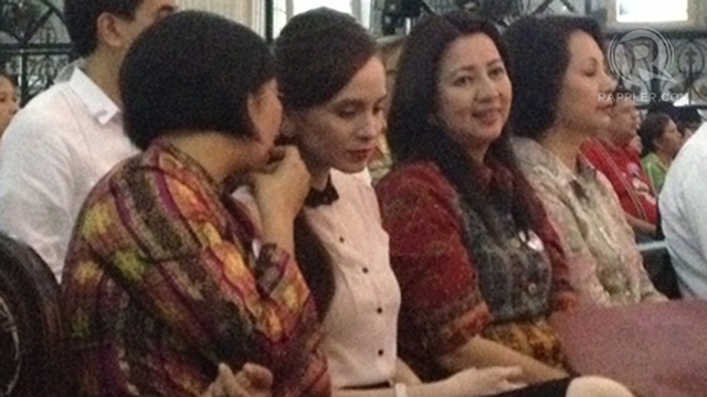 OPPOSING RH. Legislators against the RH bill, like Lucy Torres-Gomez (left) and Milagros 'Mitos' Magsaysay (right), attend Monday's Mass. Photo by Paterno Esmaquel II