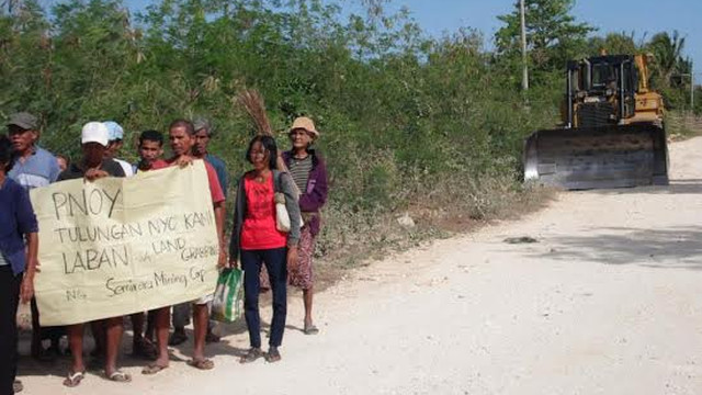 ATTEMPTED DEMOLITION. The locals of Poocan in Semirara Island, Caluya town in Antique oppose the attempted bulldozing of their ricefields. All photos from PAKISAMA