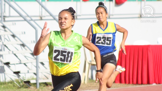 RECORDS WILL FALL. Two young women run their hearts out at Palarong Pambansa 2013. Photo by Kevin dela Cruz/Rappler