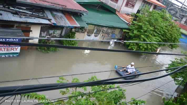 OVERWHELMED. Metro streets became rivers and seas as heavy rainfall on August 7, 2012 submerged large portions of Metro Manila, such as this street in Las Piñas, in murky floodwaters. Photo by Lauralyn Quesada