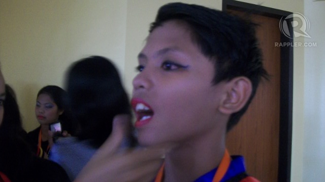 DISGUISED. The makeup makes the athletes look more convincing as warriors--while concealing their fears at the same time. Benise Balaoing