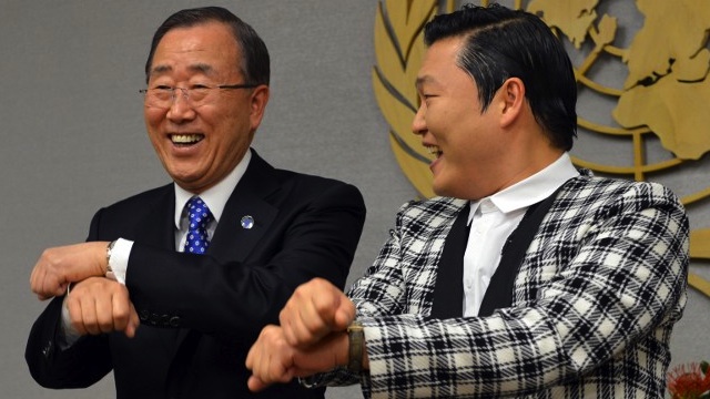 DIPLOMACY, GANGNAM STYLE. South Korean singer Psy (R), whose real name Park Jae-sang, does a dance-step with United Nations Secretary General Ban Ki-Moon (L) just before their meeting October 23, 2012 at UN headquarters in New York. AFP PHOTO/Stan HONDA