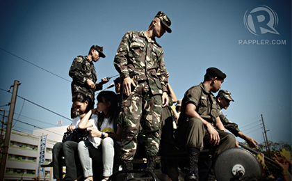 KEEPING WATCH. Soldiers join celebrations commemorating the 26th year of Edsa. Photo by Adrian Portugal