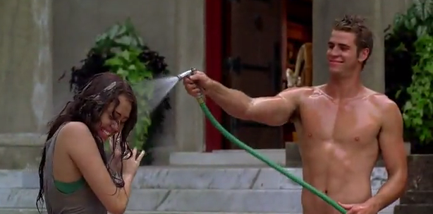 HUNK FROM DOWN UNDER. Hemsworth with his new fiancee in a scene from 'The Last Song.' Screen grab from YouTube