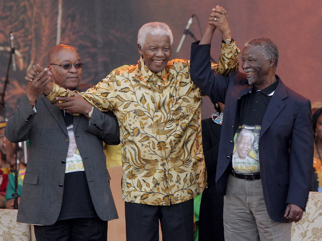 LEADERS. Nelson Mandela celebrates his 90th birthday in Pretoria, South Africa with former South African president Thabo Mbeki (right) and current president Jacob Zuma (left). File photo by Kim Ludbrook/EPA