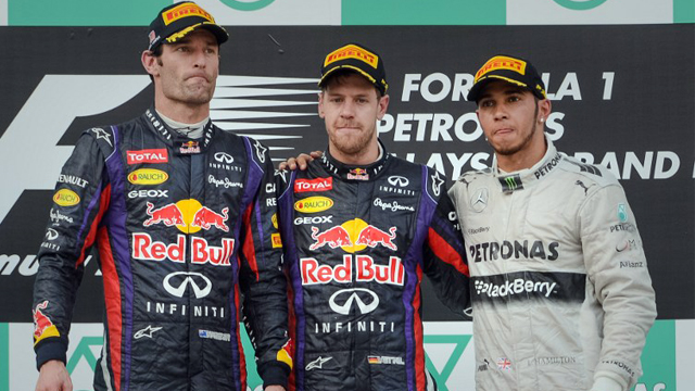DISAPPOINTED. Mark Webber (left) doesn't seem to fond of winning second after leading for much of the race before being overtaken by teammate Sebastian Vettel against their team's orders. Photo by Philippe Lopez/AFP
