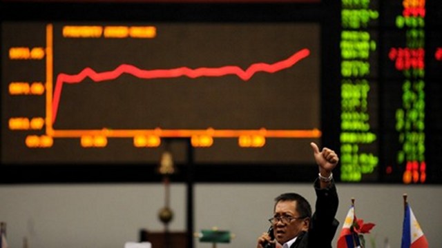 ROBUST EARNINGS. Net income of Philippine Stock Exchange-listed companies grows 18% in January to September 2012. Photo from AFP 