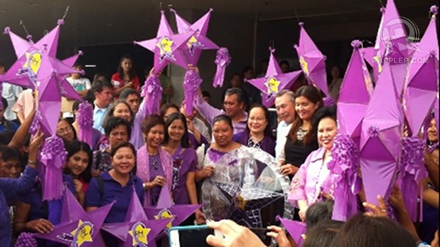 'PURPLE CHRISTMAS.' RH advocates led by the Reproductive Health Advocate Network visit the Senate to give "RH now" lanterns to RH sponsors Sen Pia Cayetano and Sen Miriam Defensor Santiago. Former Health Secretary Alberto Romualdez was also present. Photo by Ayee Macaraig 