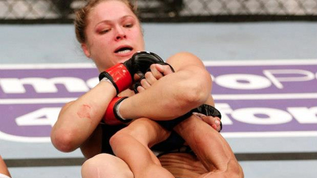 ARMBAR QUEEN. Ronda Rousey snaps on a submission hold during her UFC bantamweight title reign. File photo from UFC.com