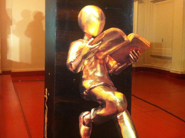 BOOK PRIZE. The National Book Awards trophy was designed by Michael Allen Cacnio, a world-class brass sculptor of the social realist genre