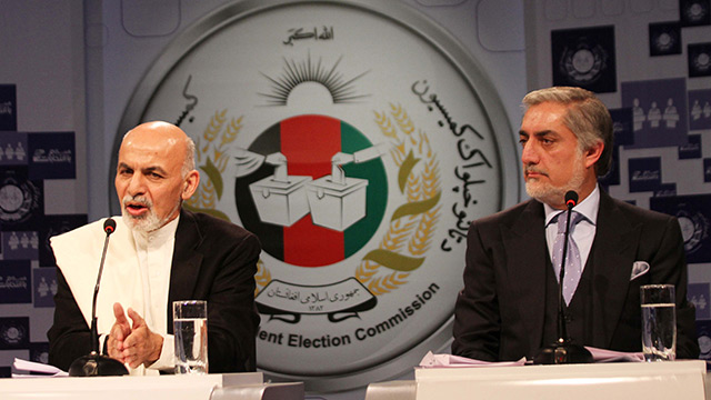 ONE-ON-ONE. Afghan presidential candidates Ashraf Ghani (L) and Dr. Abdullah Abdullah take part in a debate at 1 TV in Kabul, Afghanistan on February 8, 2014. S. Sabawoon/EPA