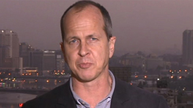 Al Jazeera Correspondent Peter Greste is still in custody of Egyptian police - al-jazeera-egypt-20131230