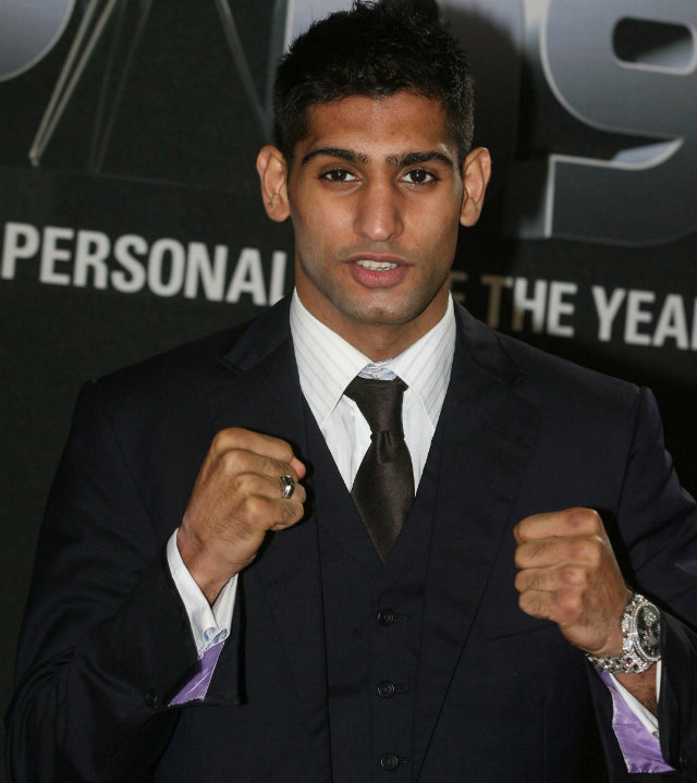 KHAN CAN DO. Former junior welterweight champion Amir Khan must beat Luis Collazo this weekend to keep his hopes of a Mayweather fight alive. Photo by Lindsey Parnaby/EPA