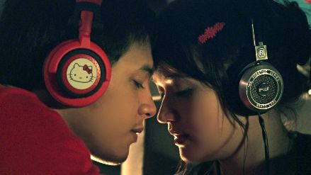 RAMON'S HELLO KITTY HEADPHONES. Movie still courtesy of Trinka Lat