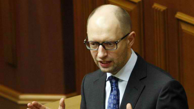 RETAIN SANCTIONS. Ukrainian Prime Minister Arseniy Yatsenyuk believes that Russia, a permanent UN Security Council member, 'constantly violates the UN charter' with regards to Ukraine. File photo by Yury Kirnichny/AFP