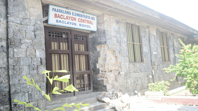 DAMAGED SCHOOLS. Part of the wall of Baclayon Central Elementary School falls down after the earthquake that hit Bohol on October 15. File photo by Edeliza Macalandag