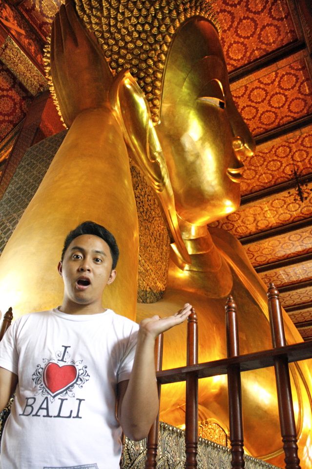 THE RECLINING BUDDHA. This structure stands 15 meters high and is 43 meters long