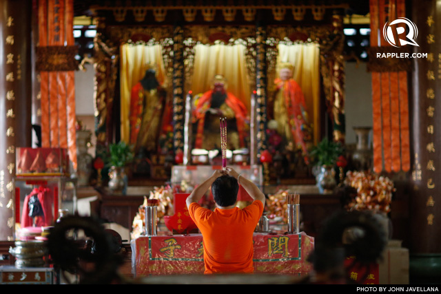 HELP FROM THE GODS. A man offers incense to the gods