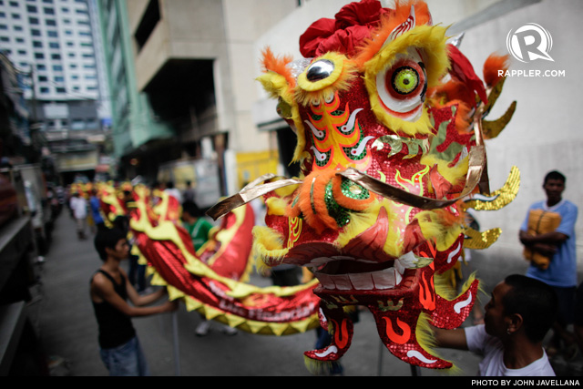 'BACKSTAGE.' A Dragon Lion is prepared for a performance in Chinatown. Photo dated February 7, 2008