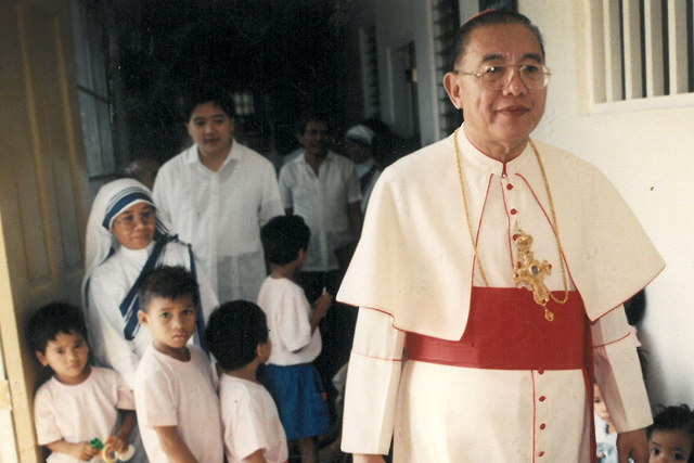 LEARNING FROM SIN. A young Socrates Villegas serves as personal secretary to the late Jaime Cardinal Sin. File photo from CBCP