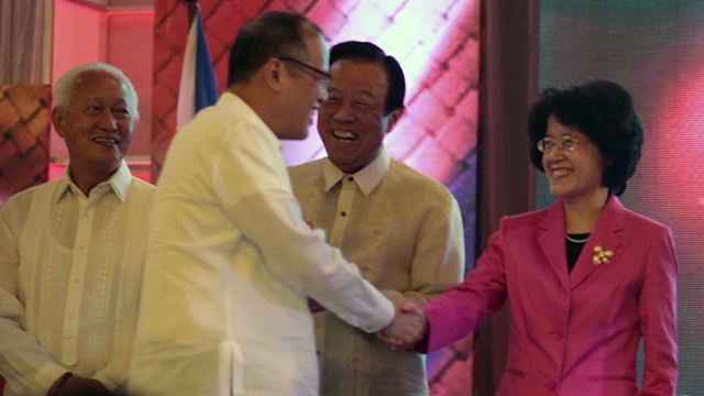 TENSE RELATION President Aquino greets Chinese ambassador Ma Keqing (R) during an official act in Manila. Photo by Gil Nartea / Malacañang Photo Bureau