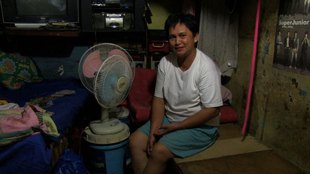 Aurea Nacivaal in her home under Del Pan Bridge