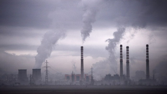 CLIMATE CHANGE. Smokes rise from stacks of a thermal power station in Sofia, Bulgaria. File photo by Dimitar Dilkoff/AFP