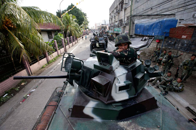 MILITARY ZONE. Soldiers in Zamboanga City. Photo by EPA