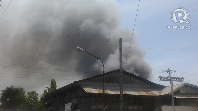 CONSTRICTED? A fire breaks out in Barangay Sta Catalina. Photo by Richard Falcatan
