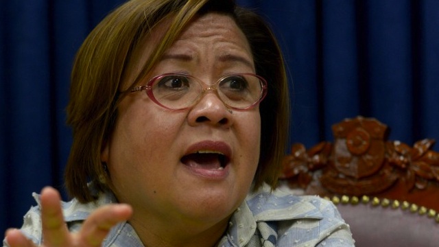 NOT 'RIDICULOUS.' Justice Secretary Leila de Lima defends the DOJ's request to cancel the passports of 37 persons, including 3 senators. File photo by AFP/Jay Directo