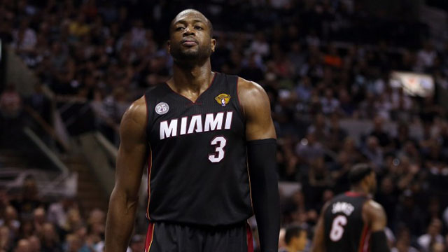 Dwyane Wade has re-signed with the Miami Heat, joining Chris Bosh and Luol Deng as they try to return to their winning ways without LeBron James. Photo by AFP/Christian Petersen.