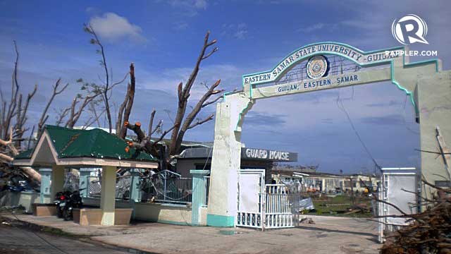 DAMAGED. The gate of Eastern Samar State University survives. File photo by BJ Geronimo