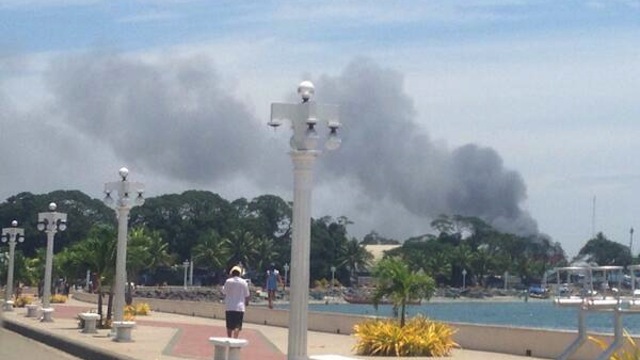 ANOTHER FIRE. Another fire as Defense Secretary Voltaire Gazmin declares the Zamboanga City Crisis is almost over. Photo by Karlos Manlupig