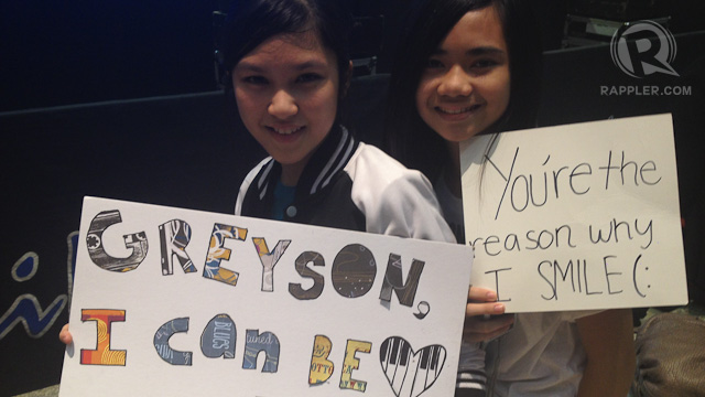 READY AND WAITING. Two young Greyson fans who were at the area early to wait for their favorite young singer