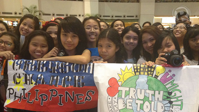 MORE FAN ART. Greyson's fans watching outside the metal stanchions were happy to welcome him back to Manila