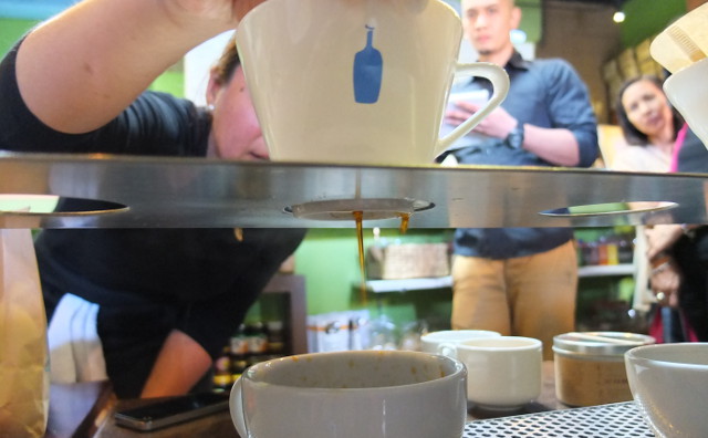 LET IT DRIP. Coffee drips from the ceramic dripper into a mug as demonstrated by Selina. Photo by Pia Ranada