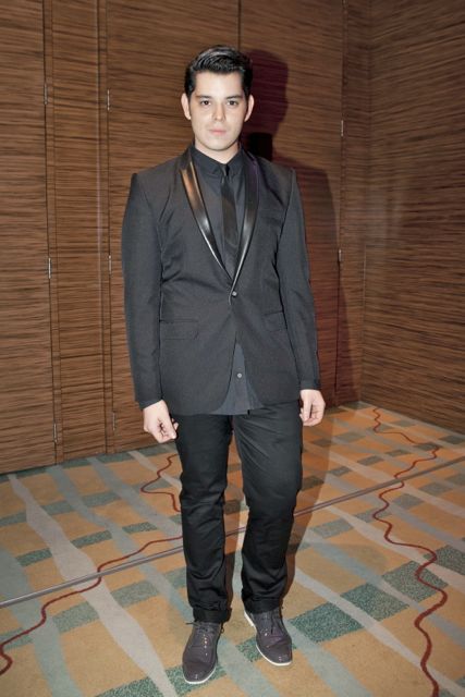 SOCIETY EDITOR RAYMOND GUTIERREZ