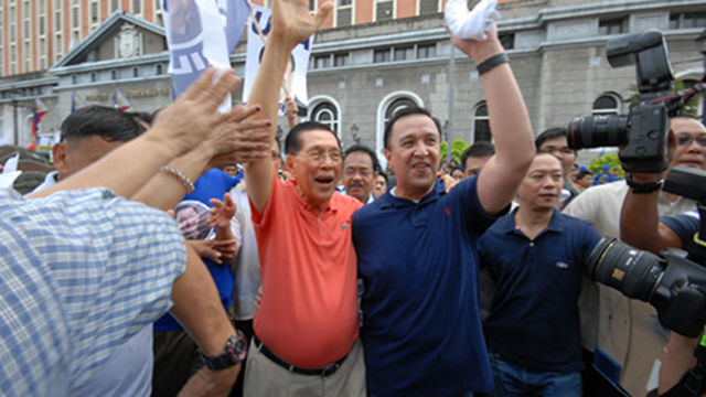 FATHER & SON. Enrile accompanies his son, Cagayan Rep Jack Enrile in filing his certificate of candidacy for senator. If Jack wins, the two will be together in the Senate in 2013. File photo by Joe Arazas/Senate PRIB 