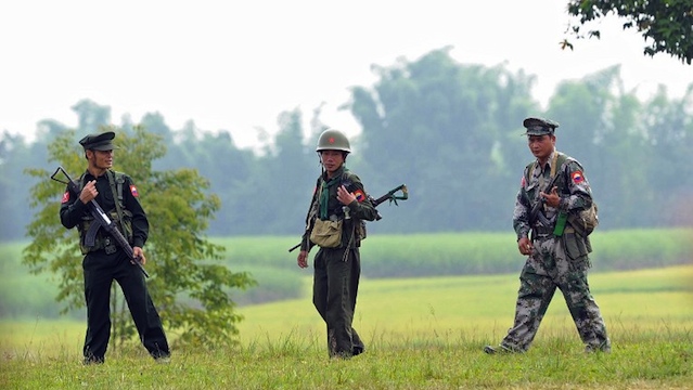 ETHNIC CONFLICT. Kachin Independence Army (KIA) soldiers patroling in Loije township near Mai Ja Yang, outside Laiza, a town in Myanmar's northern Kachin state home to the ethnic Kachin rebels' headquarters. AFP PHOTO/ Soe Than WIN