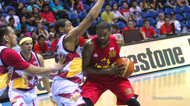 IMPORT COLA. Barako Energy's Josh Dollard goes up for a shot over San Miguel Beermen import Kevin Jones. Photo by Nuki Sabio/PBA Images