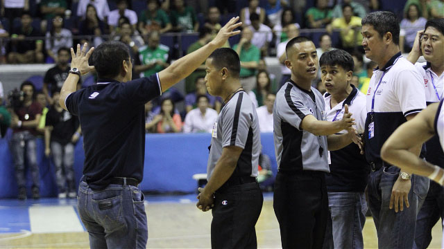 KING OF BEERS. Leo Austria, seen taking his final bows as Adamson coach, is the new San Miguel head coach. Photo by Rappler/Josh Albelda.