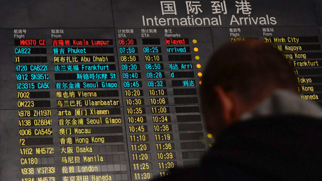 STOLEN PASSPORTS. The passports of two individuals listed as passengers on the missing Malaysia Airlines aircraft were stolen in Thailand. Photo by Mark Ralston/AFP