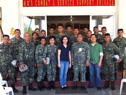 CAMPAIGN FOR PEACE. Members of the Marine Corps Combat and Service Support Brigade in Zamboanga receive balls from Rapplers Chay Hofileña and Voltaire Tupaz.
