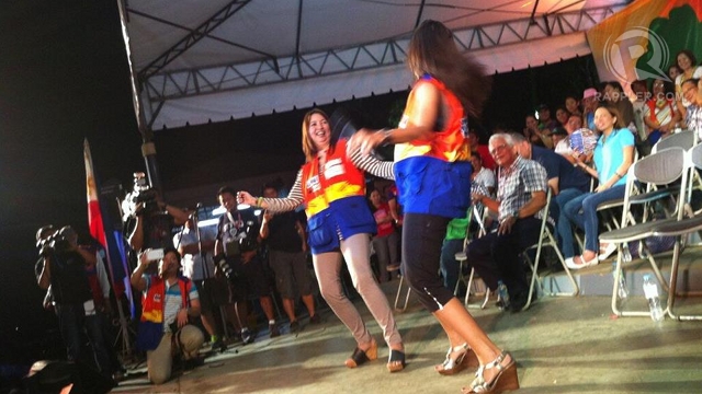 HARLEM SHAKE. Zambales Rep Mitos Magsaysay gamely does the Harlem Shake dance with actress Alma Concepcion. Photo by Ayee Macaraig 
