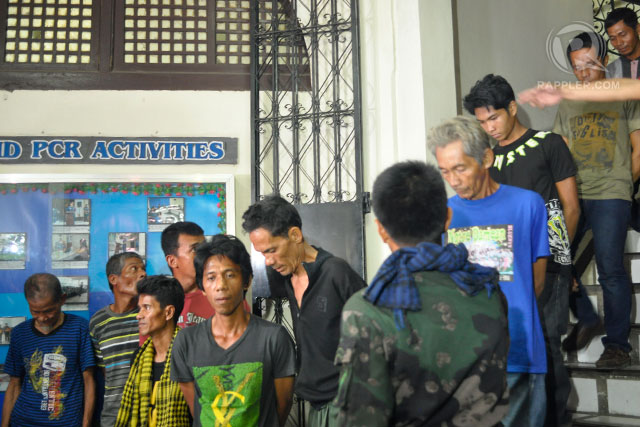 'TIRED ANG HUNGRY': This batch of 15 MNLF rebels surrendered to combined forces of military and police on September 19. Photo by LeAnne Jazul