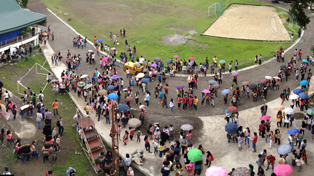 TO SAFETY. Students at the University of St La Salle in Bacolod City congregate at the school's athletic field after a magnitude 5.8 earthquake shook the Visayas, November 14, 2012. Photo by Michael Josh Villanueva. TO SAFETY. Students at the University of St La Salle in Bacolod City congregate at the school's athletic field after a magnitude 5.8 earthquake shook the Visayas, November 14, 2012. Photo by Michael Josh Villanueva.