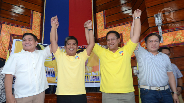 Regional board of canvassers chief Atty. Ray Sumalipao and ARMM COMELEC regional election director and state prosecutor Ramy Guiling proclaim Mujiv Hataman(2-L) and  Haroun Al Rashid Lucman (2-R) as governor and vice governor of the Autonomous Region in Muslim Mindanao. Photo by Ritchie Tono 