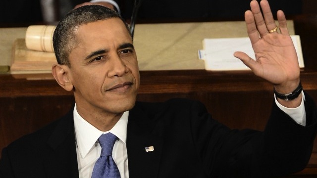 US President Barack Obama waves before delivering his annual State of the Union address to a joint session of Congress at the US Capitol on February 12, 2013, in Washington. AFP PHOTO/Paul J. Richards
