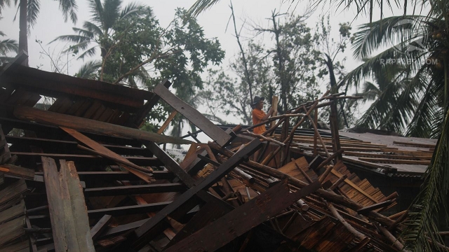 DAMAGED HOUSES. Packing winds of up to 175 km/h when it made landfall, Typhoon Pablo destroys houses and other structures in its path. Photo by Karlos Manlupig